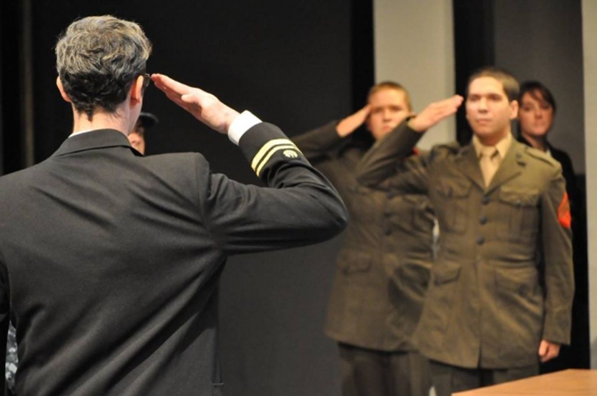 Foreground: JACOB TICE (Kaffee).  Background (L to R):  K. JENKINS (Downey), AARON MOHRS-HALE (Dawson) and NENA CURLEY (Sergeant at Arms) from the Lakewood Playhouse Production of ''A FEW GOOD MEN'' at 