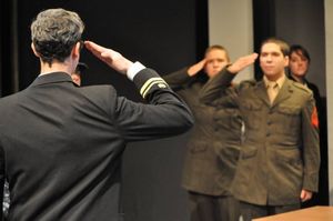 Foreground: JACOB TICE (Kaffee).  Background (L to R):  K. JENKINS (Downey), AARON MO Photo