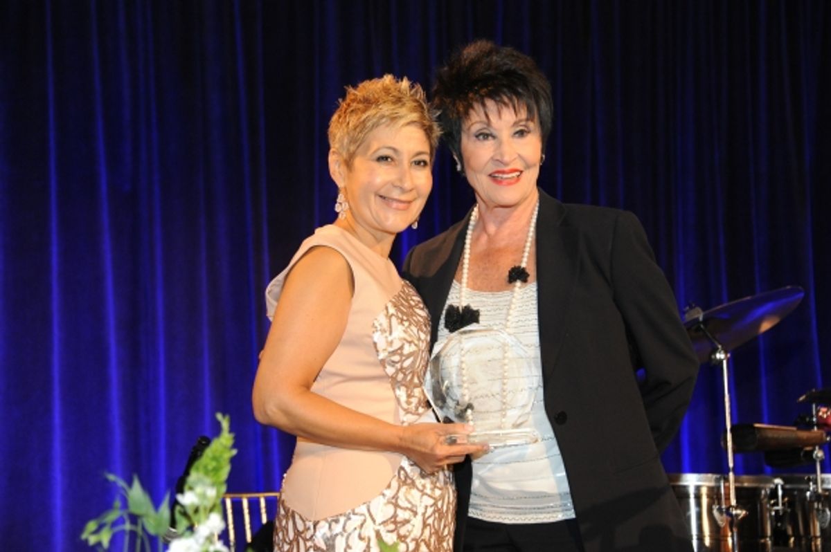 Chita Rivera receives the 2015 Latina Legend Award from 100 Hispanic Women, Inc. President Nancy Genova at 