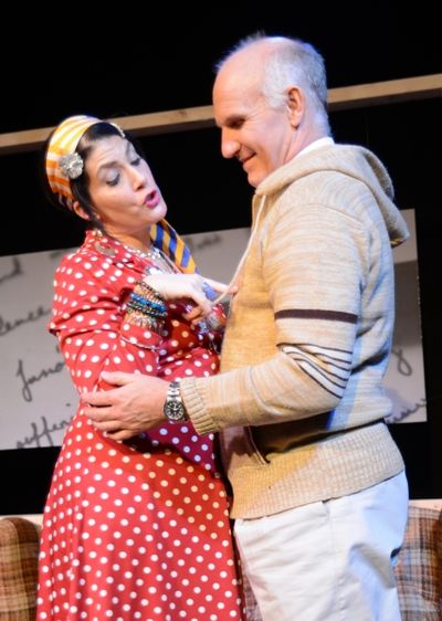 Beverly (Lisa Maxine Melinn) surprises Brian (Dennis Kleinsmith) with a visit Photo