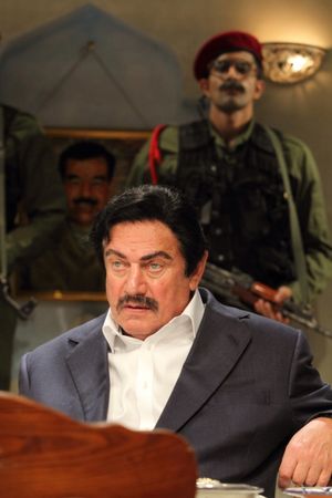 Steven Berkoff (Saddam Hussein) and Bally Gill (Soldier) Photo