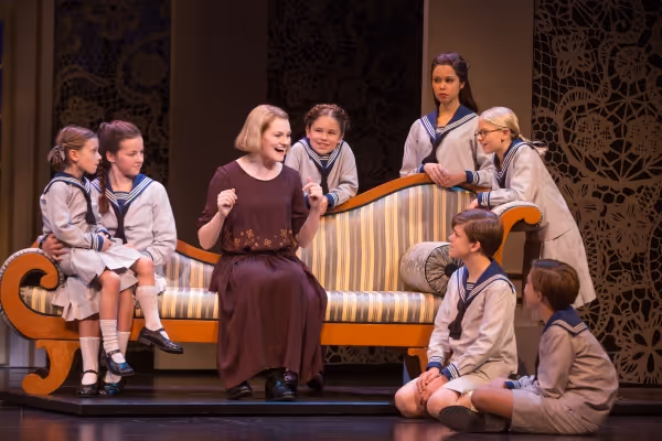 Kerstin Anderson as Maria Rainer with the von Trapp children (from left, clockwise):  Photo