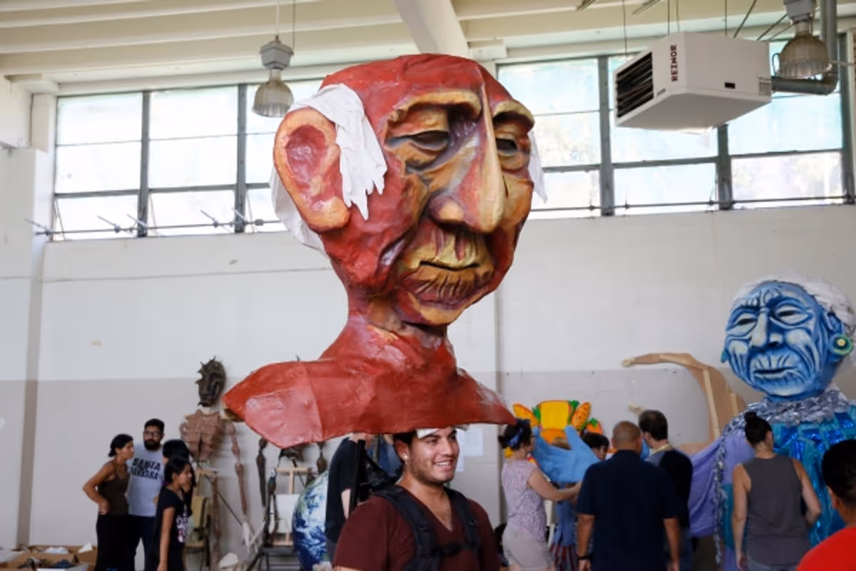 Damien Medel mans the head of the Grandfather puppet at In Rehearsal for El Teatro Campesino's POPOL VUH: HEART OF HEAVEN at Grand Park