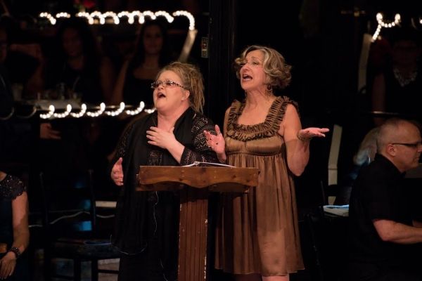 Jamie London and Ginger Newman pay tribute to Honoree Larry Keeton Photo