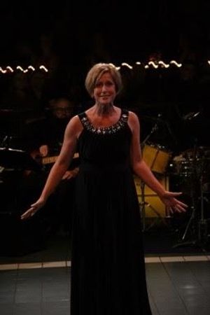 Janet Holeman sings for Honoree LB Gaiters Photo