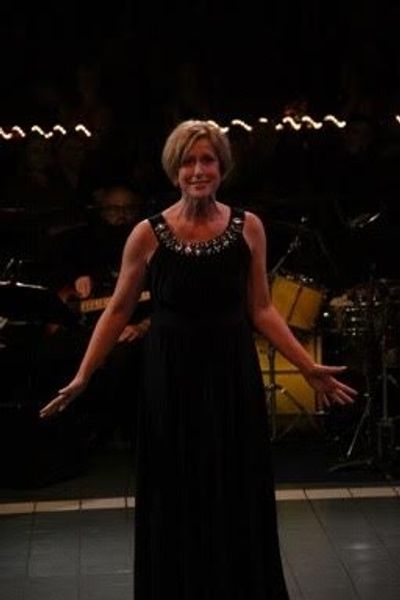 Janet Holeman sings for Honoree LB Gaiters Photo