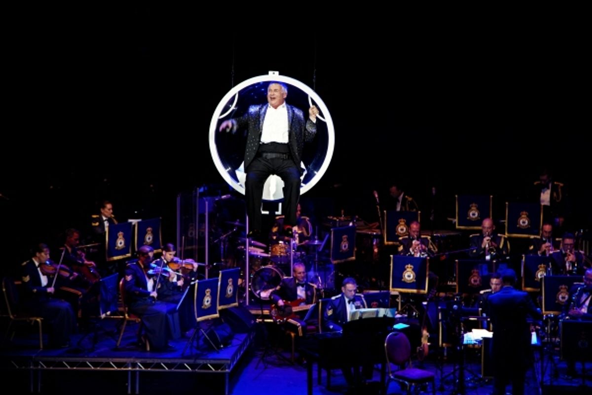 Christopher Biggins makes a spectacular entrance at 