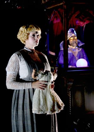 The mysterious Jane Doe (Emily Rohm), the one unidentified body of the Cyclone roller coaster disaster, is observed by the mechanical fortune teller The Amazing Karnack (Karl Hamilton) @ BroadwayWorld The mysterious Jane Doe (Emily Rohm), the one unidentified body of the Cyclone roller Photo