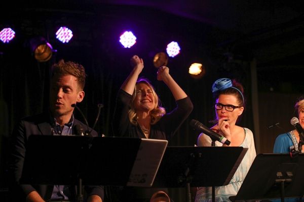 Barrett Foa, Mary Faber and Mary Birdsong react to the ballot counting. Photo