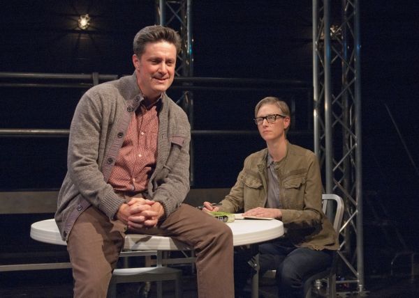 Ensemble members Tim Decker (left) and Kelli Simpkins portray a grieving father and a Photo