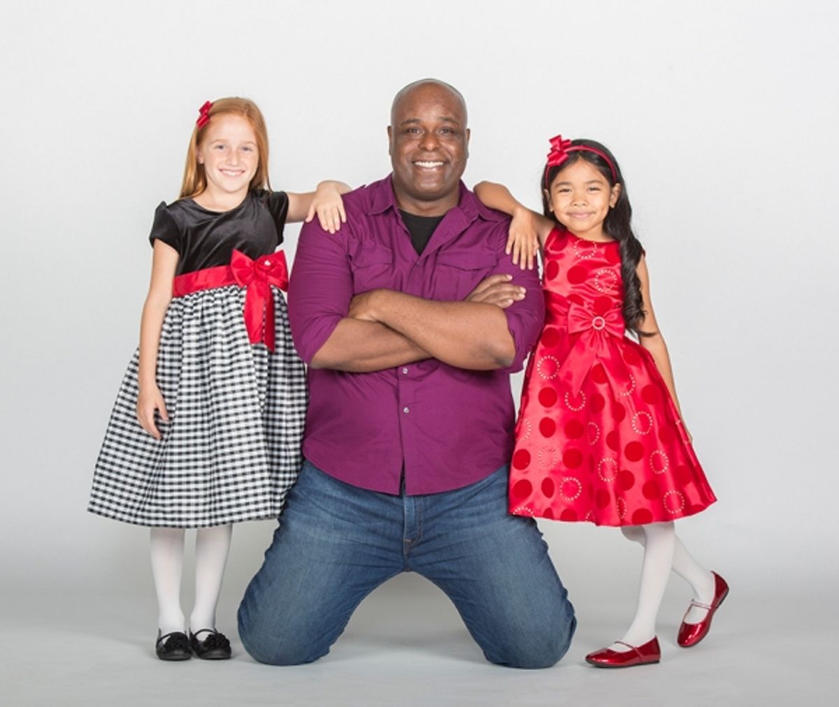 J. Bernard Calloway stars as The Grinch and (from left) Taylor Coleman and Mikee Castillo as Cindy-Lou Who at 