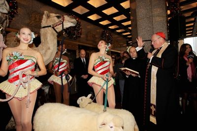 Timothy Cardnal Dolan and The Rockettes Photo
