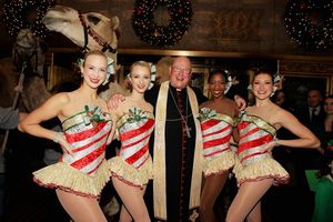 Timothy Cardnal Dolan blesses the animals with The Rockettes: Karen Ritchie, Tori Sch Photo