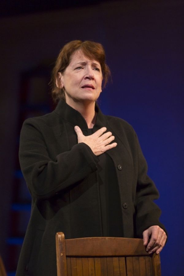 Ann Dowd as Dore Photo