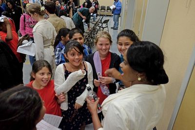 Young audience members discuss the show with Monique Gaffney after a performance for  Photo