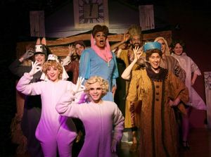 ''A Manger Spectacular'' - Flanked by The Wise Men and barn animals, Joan Crawford (David Cerda, center) sings
''I''m Mary,'' the opening number of her latest film, a musical adaptation of the life of The Virgin Mary @ BroadwayWorld ''A Manger Spectacular'' - Flanked by The Wise Men and barn animals, Joan Crawford (D Photo