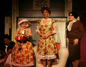 ''Merry Christmas, Christina'' - Vernita (Robert Williams) looks on as Christina Craw Photo