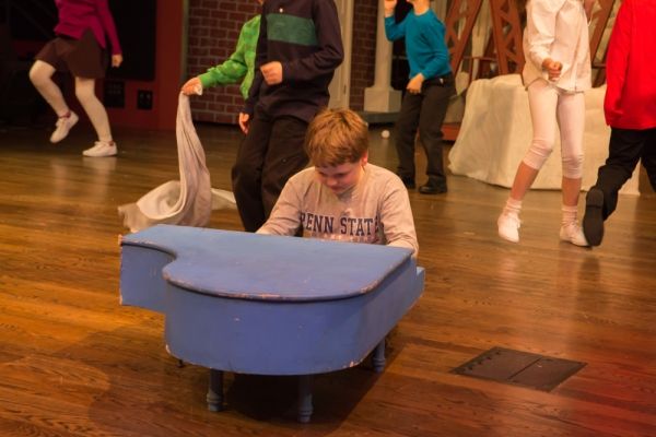 Schroeder (Fletcher Smith) plays the well-loved Peanuts dance as the characters from  Photo