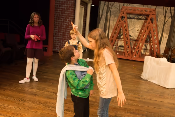 Lucy (Samantha Koegler) assigns Linus (Matthew Milunic) his part in the Christmas Pla Photo