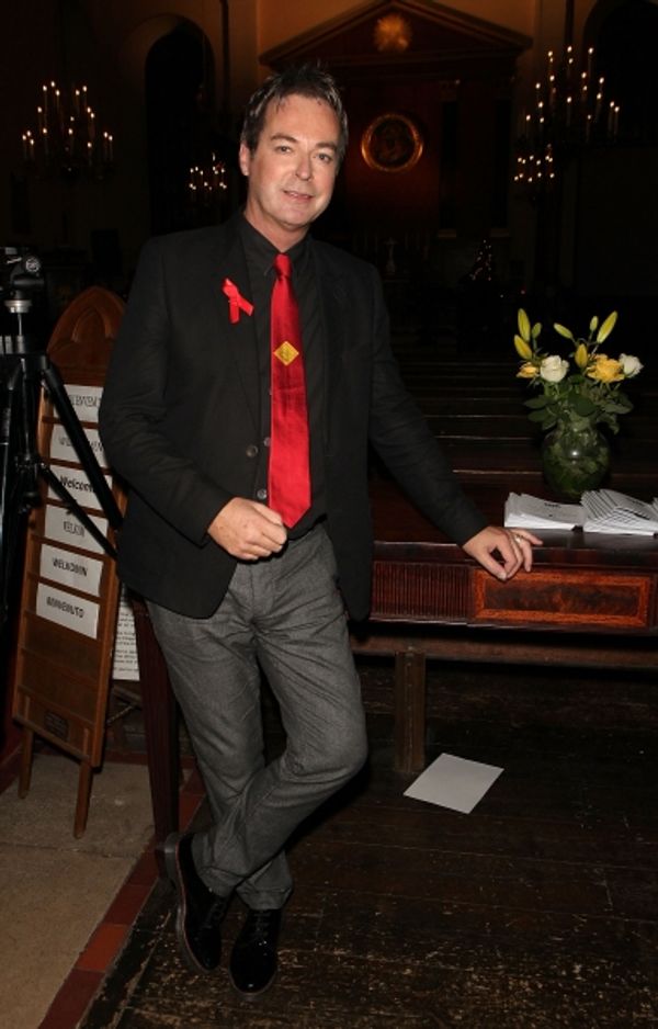 LONDON, ENGLAND - NOVEMBER 25:  Julian Clary attends ''A Source of Life: 25 Years of  Photo