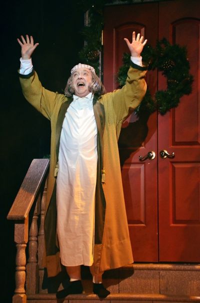 Ebenezer Scrooge (Eddie Curry) is elated to discover he hasn''t missed Christmas afte Photo