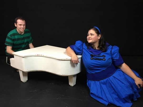 Zackery George as Schroeder and Rea Scanlon as Lucy Photo