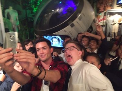 Chris Trousdale takes selfies with students of Dolores Mission School Photo