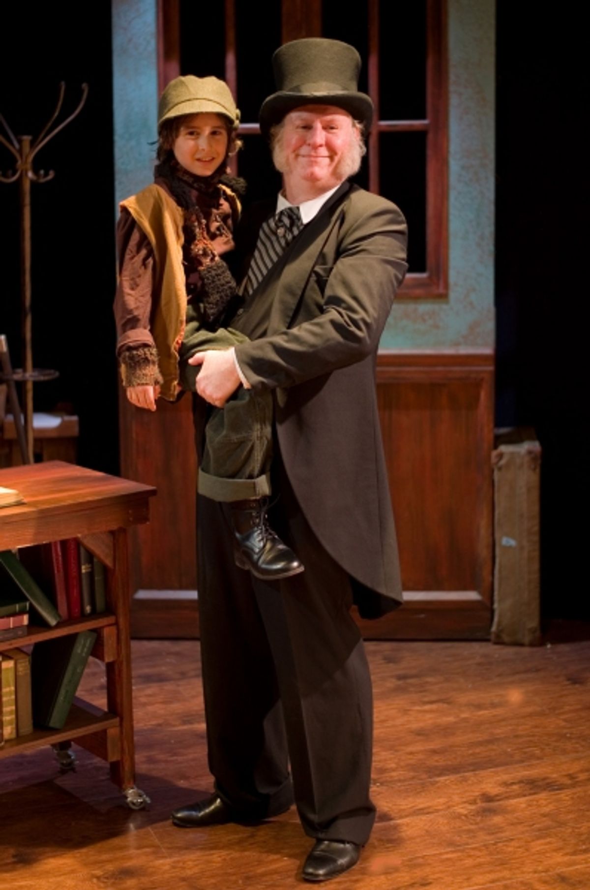 Silas Wade as Tiny Tim & Michael Selkirk as Ebenezer Scrooge. at 