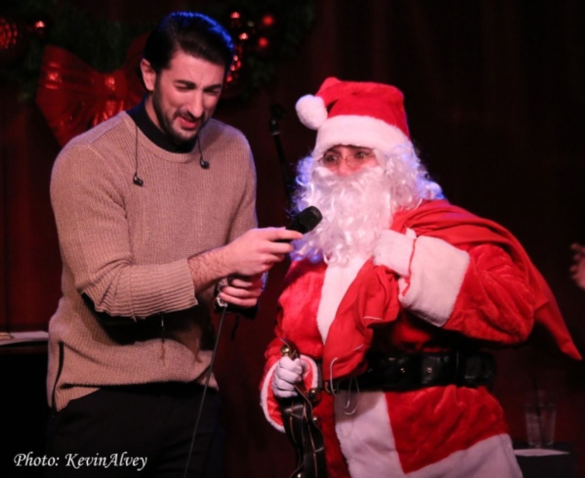 Brandon Rubendall and Santa at 
