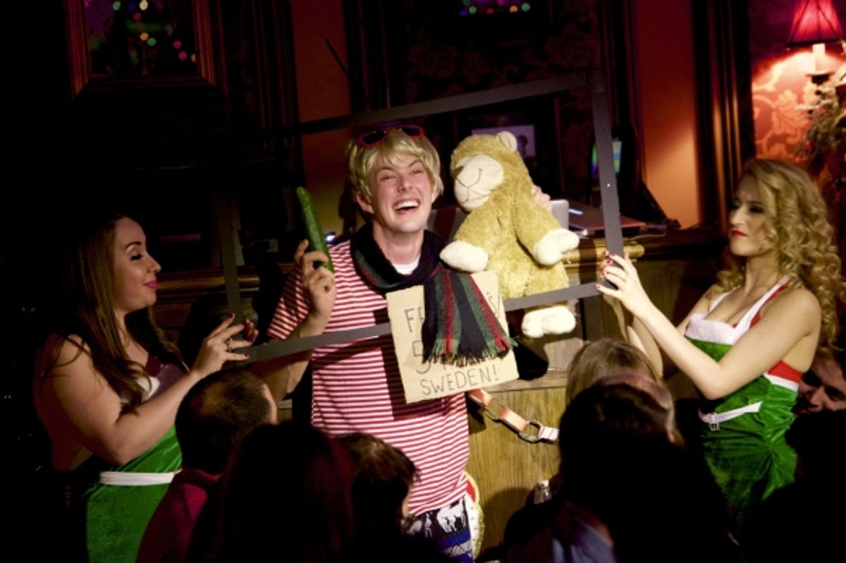 Jordan Stanley chimes in as Jo-Ha with mistletoe munchkin Jessica Kent, at his side. at 