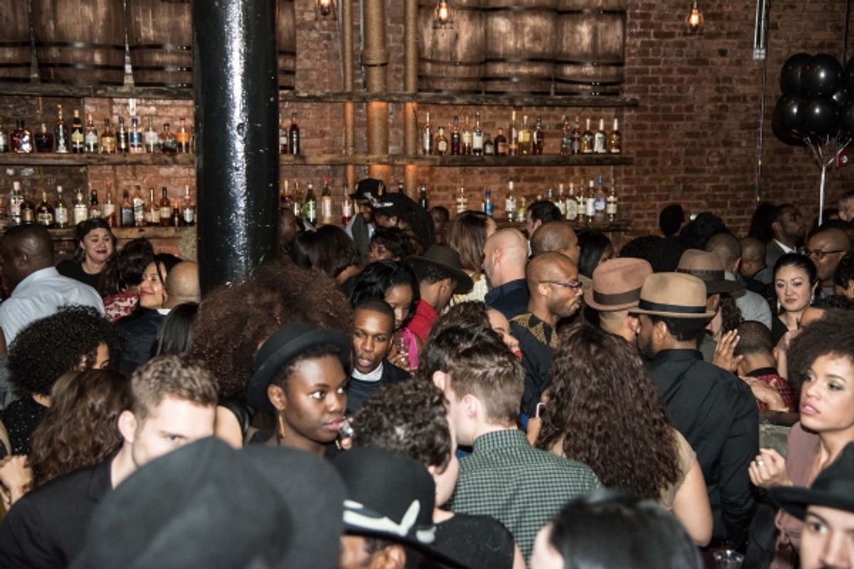 The crowd, including Leslie Odom Jr. at 