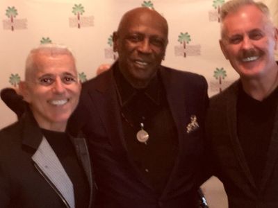 producers Michael Anastasio and Richard Eric Weigle with Oscar-winning actor Louis Go Photo