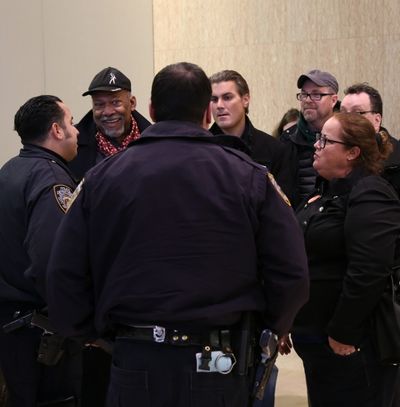 SAG-AFTRA NY President Mike Hodge with staff being greeted by NYPD Photo