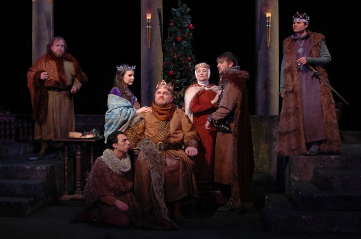 Charles K. Hodges (seated, center) portrays King Henry II in The Lion in Winter at Theatre Memphis on the Lohrey Stage, January 22 - February 7, 2106. He is flanked far left by Jeff Posson and far right by Nic Picou and surrounded by (clockwise from botto at 