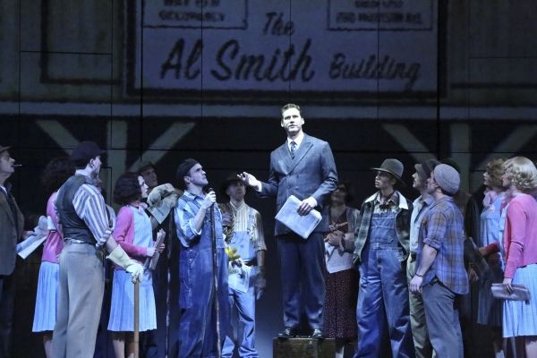 Kevin Earley (center) and the company Photo