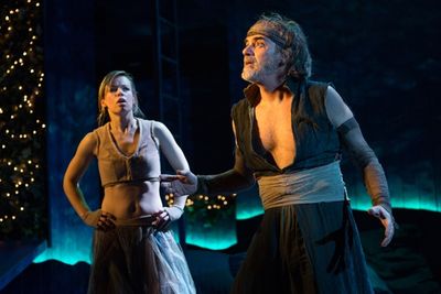 Puck (Erin Weaver) listening carefully to Oberonâ€s (Eric Hissom) mischievous plan Photo