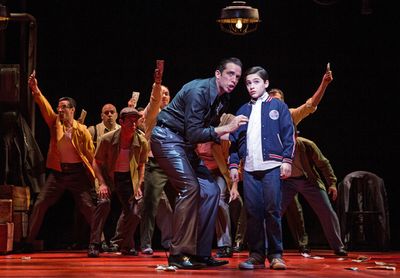 Nick Cordero (Sonny) and Joshua Colley (Young Calogero), center, and the men of A BRO Photo