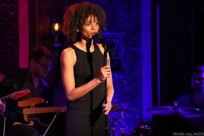 Kristen Browne singing 'Addicted' Photo