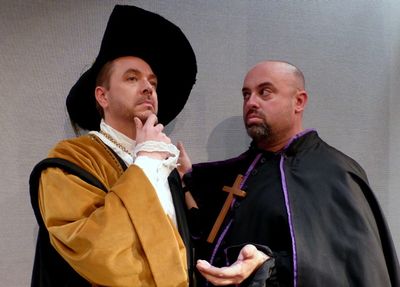 Dr. Carrasco seeks advice from the Padre. â€” with Daniel Kruger and Peter Mille Photo