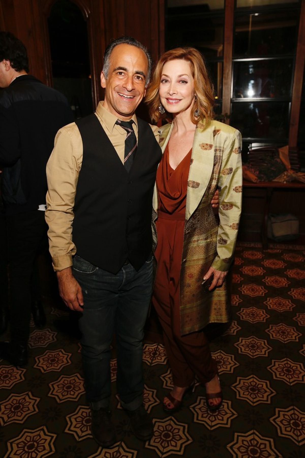 Cast members David Pittu and Sharon Lawrence at 