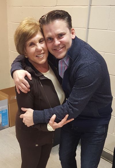 CAGNEY producer Riki Kane Larimer gets a big hug from her star Robert Creighton.  Photo
