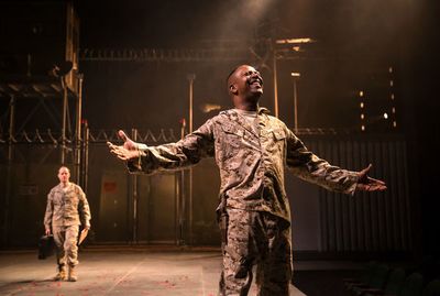 Othello (James Vincent Meredith, at right) delights in his good fortune, as the dupli Photo