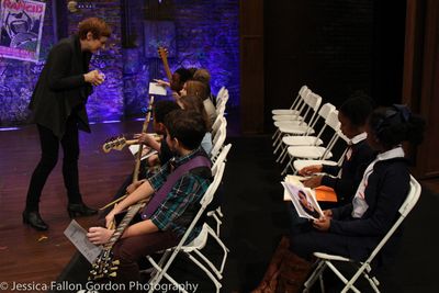 Tara Rubin speaks with some School of Rock auditionees Photo