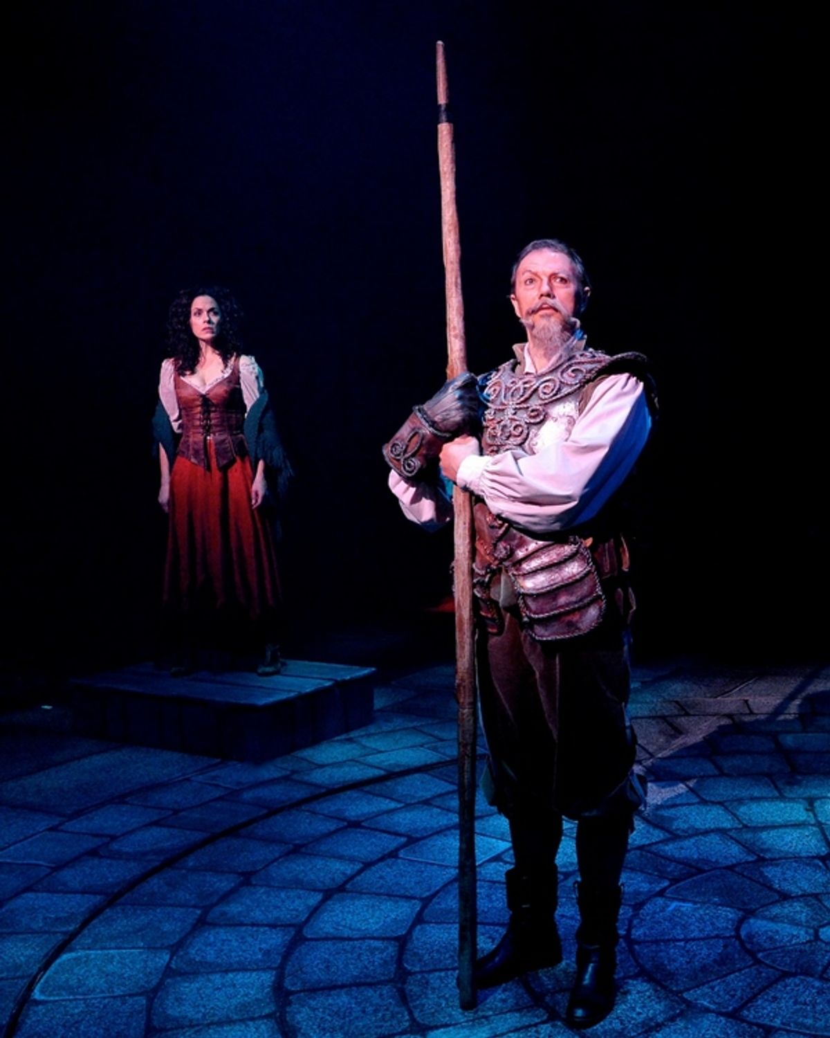Paul Schoeffler as Don Quixote and Michelle Dawson as Aldonza (background) at 