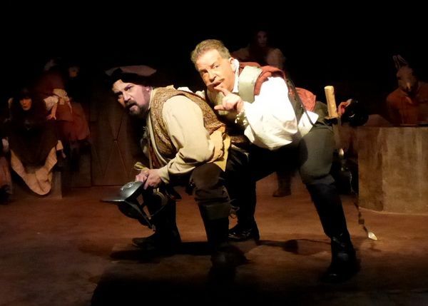 Sancho and Don Quixote plan their next adventure. From left: Bradley Miller, Ben Lupe Photo