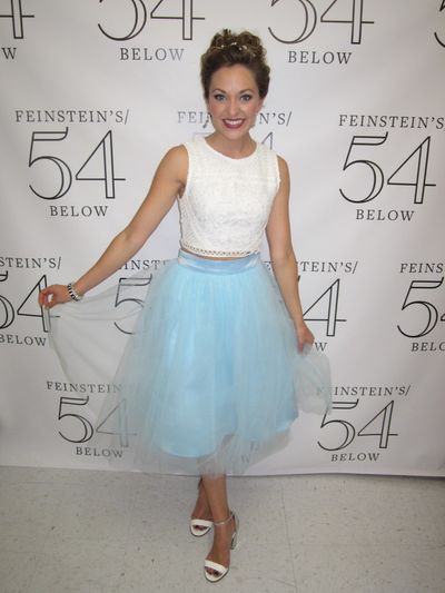 The host, Laura Osnes, as ''Cinderella'' Photo