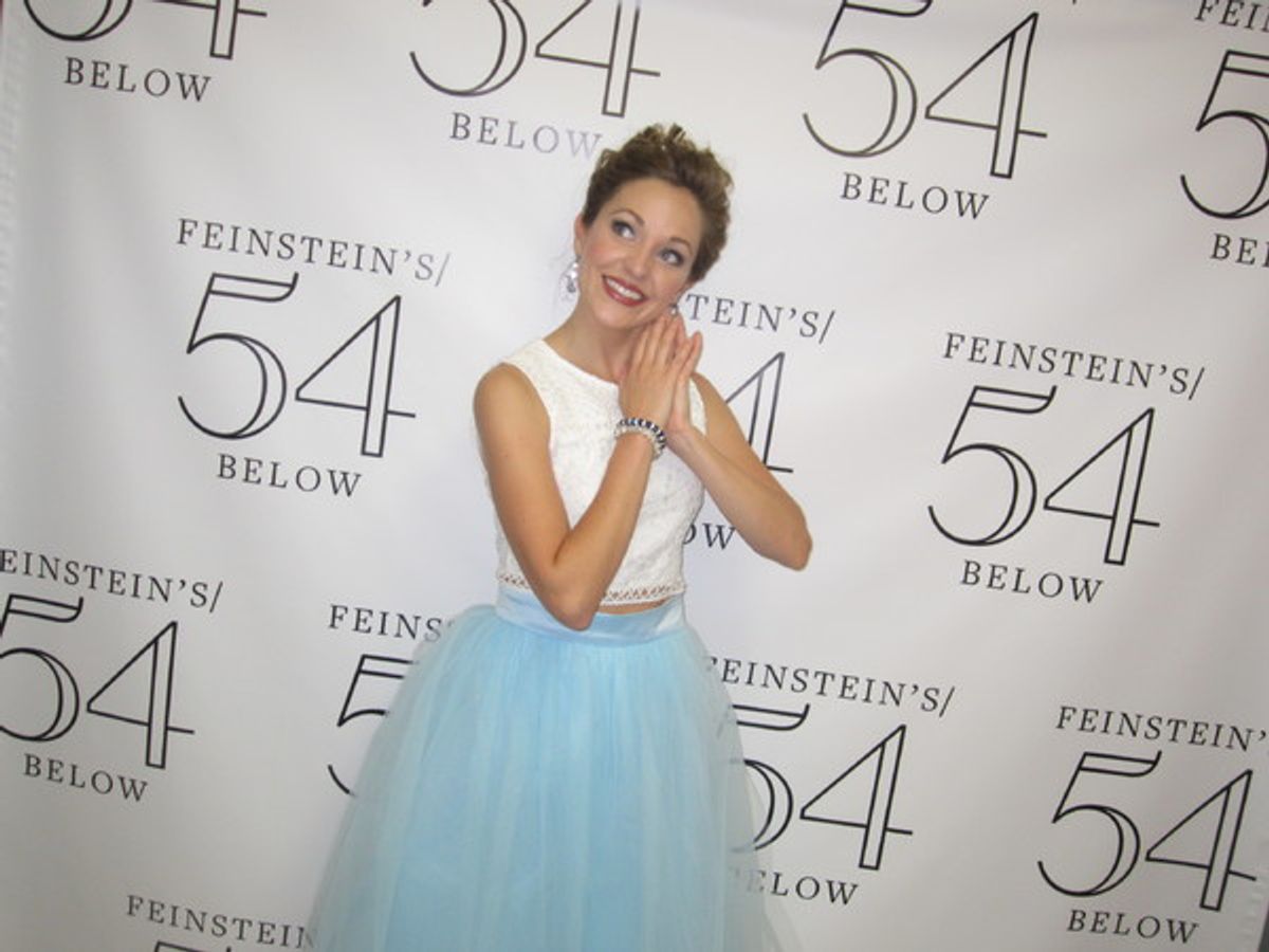 The host, Laura Osnes, as 'Cinderella' at 