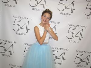 The host, Laura Osnes, as ''Cinderella'' Photo