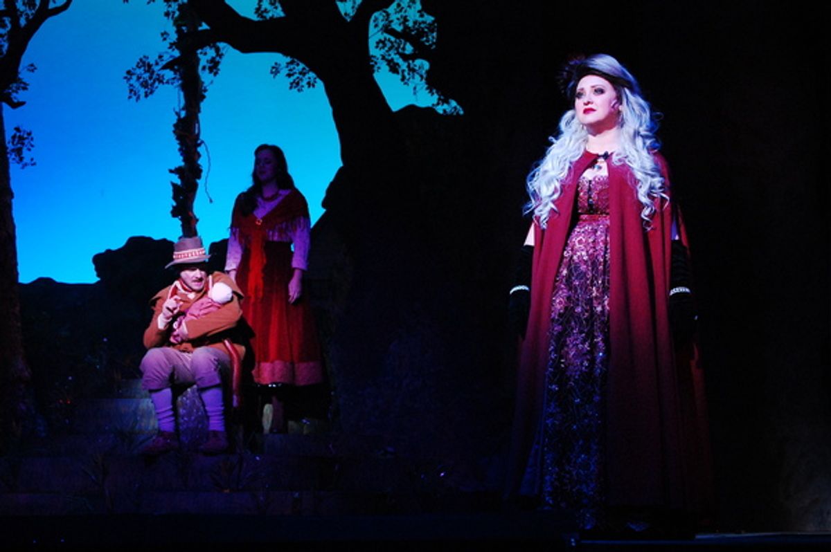 Renee Davis Brame (right) as The Witch with Lee Gilliland (left) as the  Baker holds his child and the Baker''s Wife, Lynden Lewis, looks on from the shadows. at 