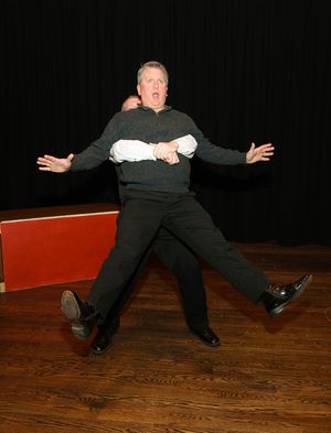 Charley Wykeham (Paul Michel) pulling Lord Fancourt Babberly (Steve Dincau) out of wi Photo